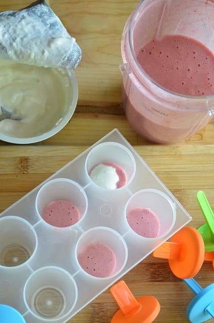 strawberries in popsicle molds