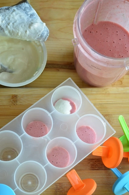 strawberries in popsicle molds